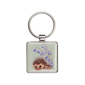 Forward facing studio image of Wrendale Hedgehog Keyring on green background. Made using zinc alloy metal.