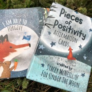 Lifestyle photo of Fox Under The Moon Affirmation Cards Set, boxed picture cards of motivational thoughts.